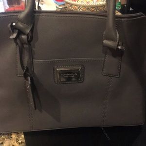 Tiganello purse  lots and lots of pockets